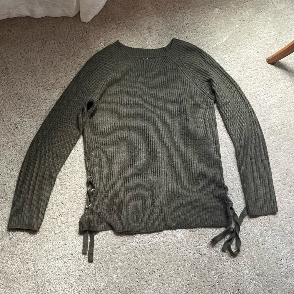 Green sweater with tie sides
